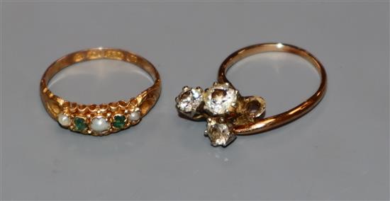 A Victorian 15ct gold, emerald and split pearl five stone half hoop ring and a three stone diamond ring(a.f.).